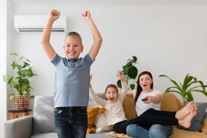 Happy Family Sitting in a room in North Bristol home